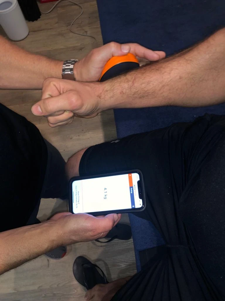 Player at Sports and Spine Physiotherapy in Brookvale - Northern Beaches receiving expert physiotherapy taping and sports injury treatment.